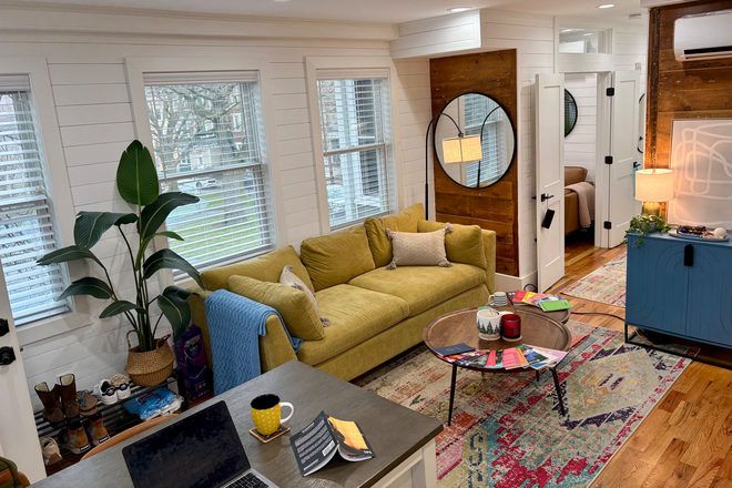 Living Room - Furnished 1BR + Den w/ Park Views & Deck | Near Longwood + Universities | Utilities Included