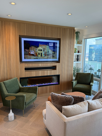 Feature Wall in Living Room - Fully Furnished & Equipped Stunning Jr. 1 bedroom