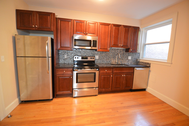 x - COOLIDGE CORNER 2 BED PLUS HEATED SUN PORCH - HEAT AND HW INCLUDED - PARKING SPACE INCLUDED