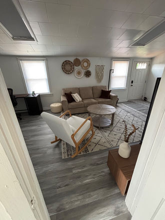 2nd floor entrance, large living room, w/ tv and office space. - Nice, spacious one bedroom apartment .