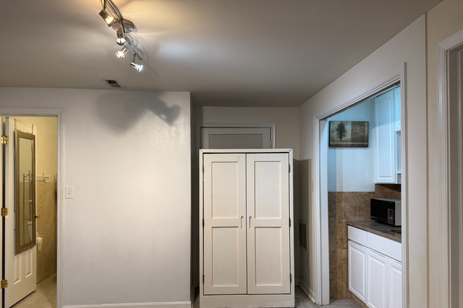 Living area - Basement Studio private entrance, full bath, kitchenette, Across Braddock from GMU Townhome