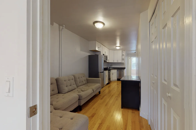 Living room - 123 E 7th St. Apartment