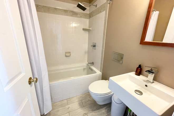 Bathroom - Spacious 4BR Single-Family on Holden St – 3 Floors, In-Unit Laundry Apartments
