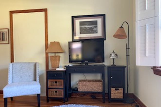 living area - Duplex like property fully furnished, all utilities included (wi-fi) Direct TV, W/D. 2 mi. to MUSC