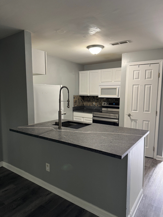 Kitchen area with pantry - Condo with Beautiful Porch Space