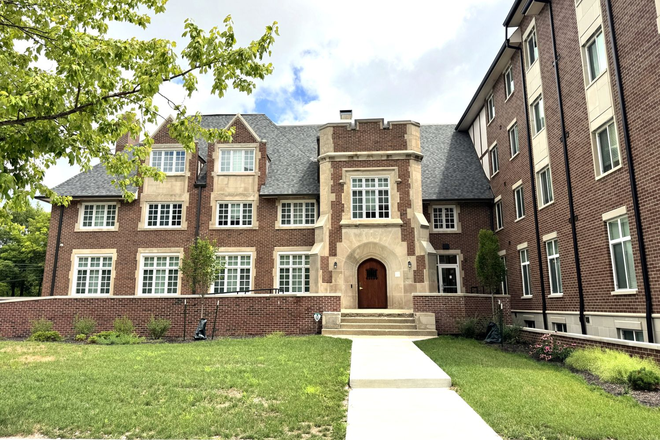 Main entrance facing Russell Street, on the corner of 4th and Russell Streets. - Revive on Russell, Studio, 1-, & 2- bedroom apartments in the heart of the West side at Purdue.