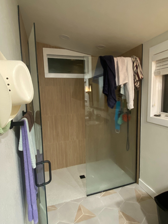 Bathroom shower that has a Water shower head - Master bedroom with private bath and 3 closets the room and SkyLights