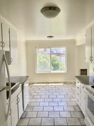 kitchen + dinning room - Two Spacious Bedrooms Available, Perfectly Located Directly Across from Campus!