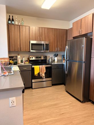 Kitchen - The apartment complex is U Club on 28th st. The complex is only a 10 minute walk to campus.