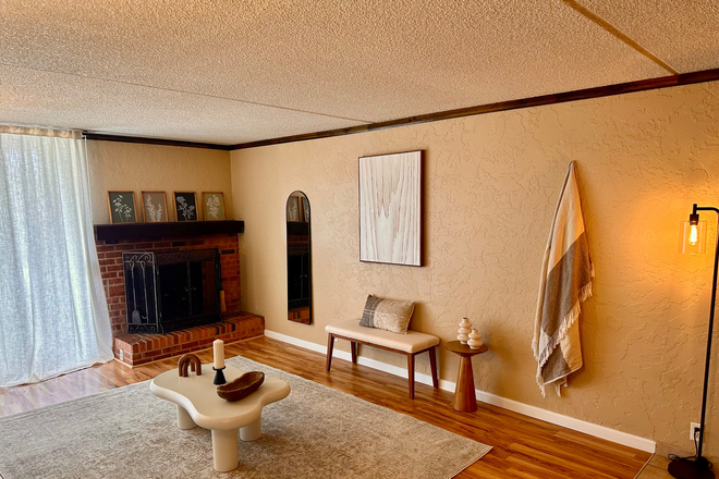 Livinfg room with fireplace - comes unfurnished - Boulder-near CU Campus Large 1 bedroom condo for rent - best deal!