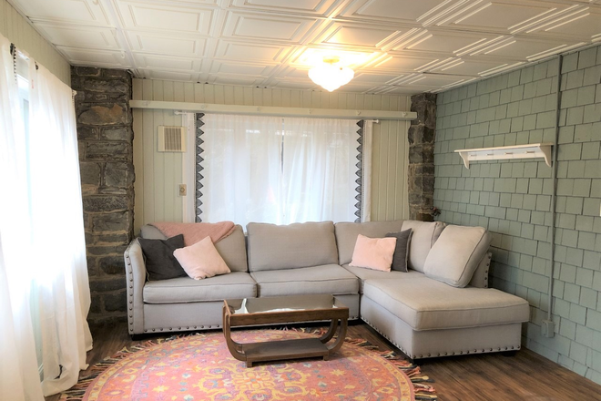 Living Room- Sectional Sofa, Arm Chair, Coffee Table, two side tables - Gorgeous Garden Apartment in Roland Park