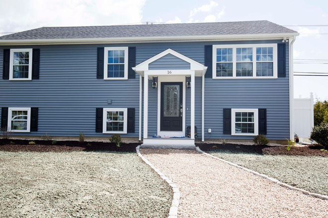 Front of House - Available for a group of 5! Modern split level home!