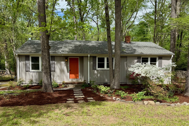 Front of home with recently landscaped yard - Renovated 3BR Near UNC * Walk to University Place * Granite Kitchen * Bus Line