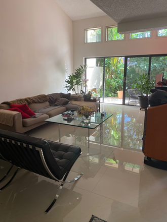 Living room of modern appointed home - Modern East Boca Furnished Room, private full bath