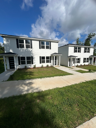 Building Exterior - Beautiful New Construction Townhomes