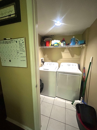 Laundry area - Boardwalk at Alafaya Trail Apartments