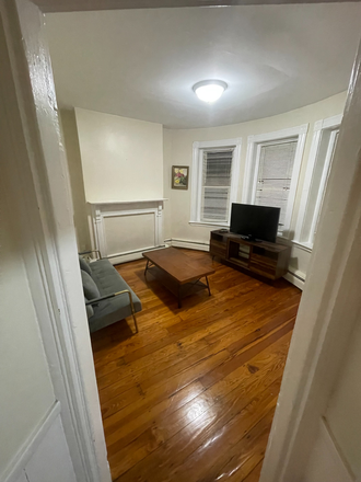 Living room - Room Available in 4BR Apartment