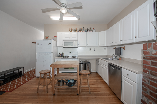 Open kitchen and dining space - Reserved Street Parking Space for Rent from 06/01/2025 - 05/31/2026 Townhome