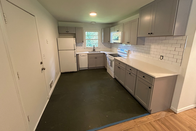 Deck access from kitchen - 2-bed, 1-bath Avondale Estates Apartment