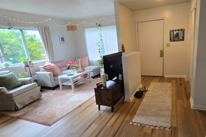 large living room lost of natural light - June 2027 Walk to UVM. Walk to everything. Parking, Washer & Dryer. Condo