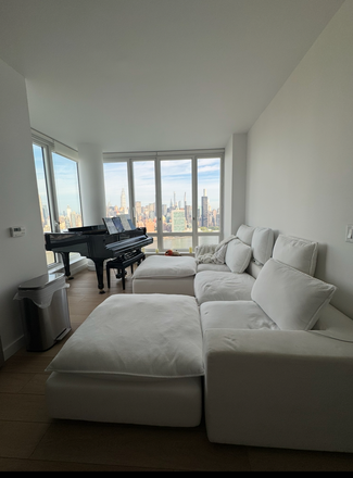 living room - 3 bedroom 2 bath Skyline Views 55th floor apt