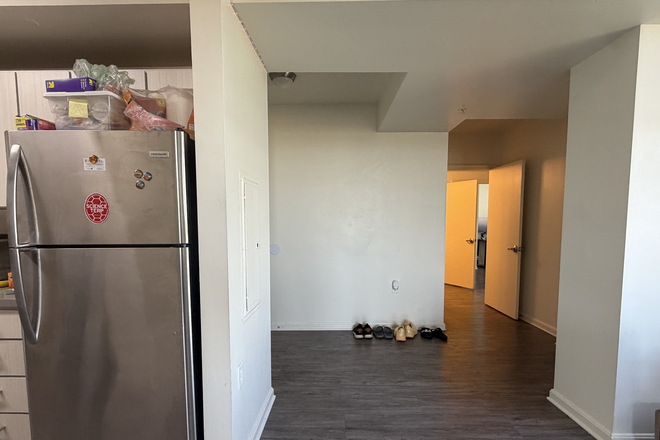 Facing apartment opening/fridge - University View 4x2 XL Apartment, Close walk to campus, Flat-rate Ameneties