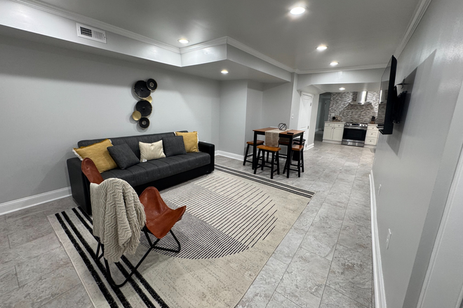 Living Room - All-Inclusive Furnished Suite in Reservoir Hill 6-10 Min to UMMC 10-15 Min to JHU - Full KIT + W/D Duplex