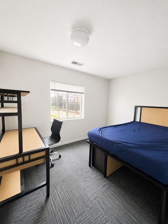 There are movable storages that can be stacked like a dresser that are under the bed. Comes with everything in photos. - Campus Village East Lansing