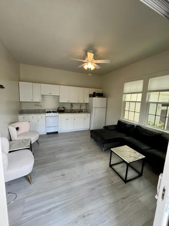 living room - Prime luxury student apartment close to campus, newly renovated, and fully furnished