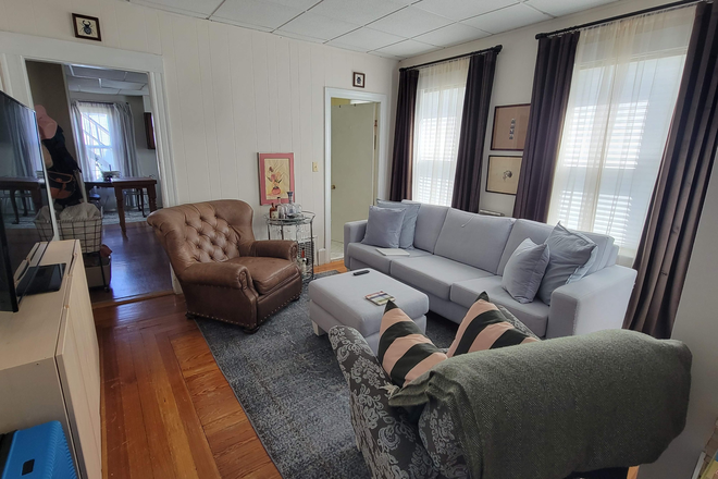 Living Room - 2 Bed with in-unit W/D! Near Davis & Porter Squares. No Fee! Apartments