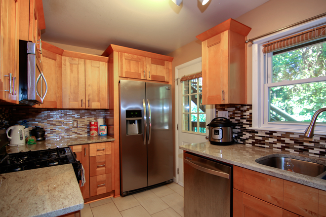 Rear entrance into kitchen - Partially Furnished and Beautifully Renovated Unit w/ Pool Access and 1 block Walk to Emory Shuttle