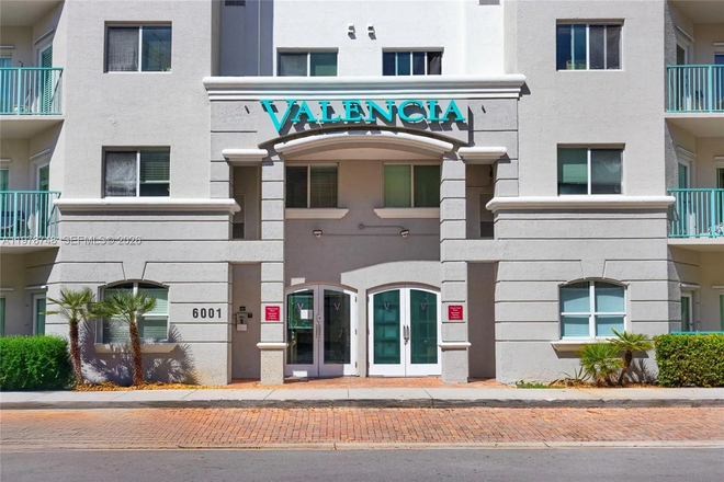 Front Buiding - Spacious 2BR/2BA Condo Near UM with 2 Parking Spaces & Resort-Style Amenities