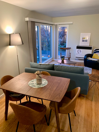 Dining / Living Room. Large windows. - 4 Blocks to Campus — Furnished 2BR/1BA North Berkeley Home with Deck & Garden