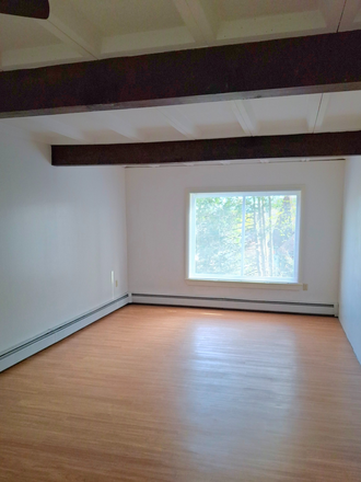 Living Room - Easy 20 Minute Commute! HEAT & HOT WATER INCLUDED! Apartments