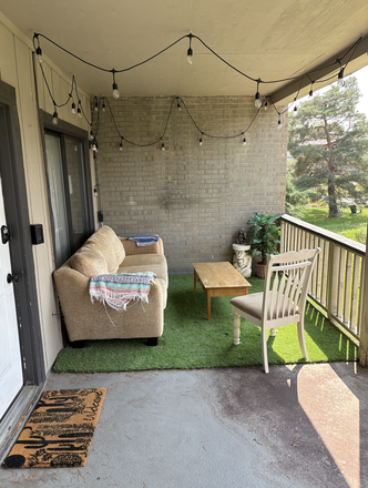 Balcony with lights and comfy seating. - Cool apartment 5 minutes from campus!