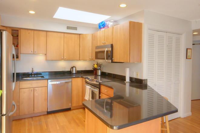 Kitchen - Stunning 4BR/2.5BA Top-Floor Penthouse near Porter Square!
