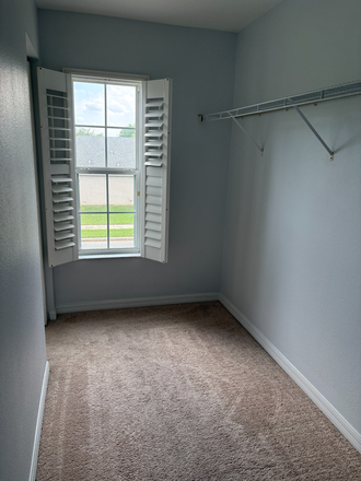 Walk-in closet - Furnished Bedroom in Immaculate, Luxury Home.
