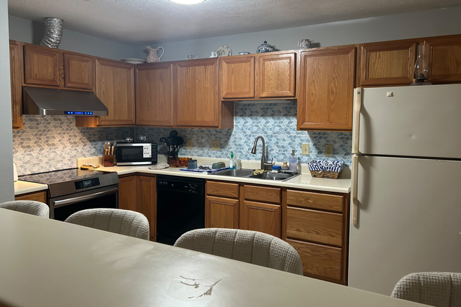 Kitchen - Furnished bedroom four bedroom, two bath condo only a few minutes away from campus