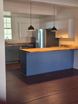 - A historic, fully renovated Postal Workers Union House preserved character, with modern new