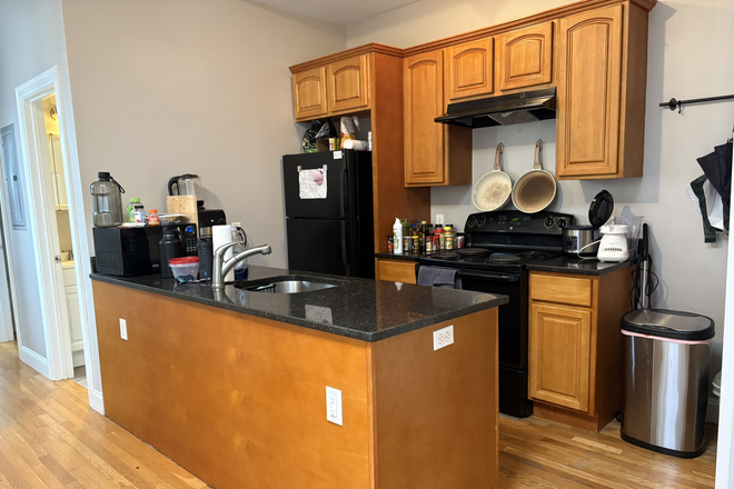 OPEN CONCEPT Living Room/Kitchen - NO FEE!!! Renovated with central A/C & FREE In-Unit Laundry just minutes from West Campus