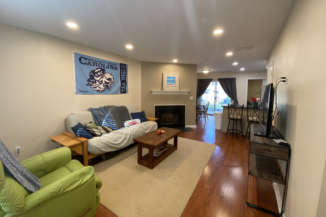 Living room looking toward kitchen/dining/patio - Townhouse on bus routes
