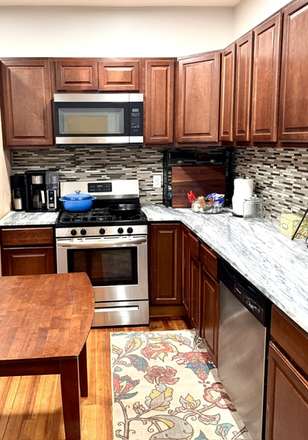 kitchen - Beautiful first floor apartment with private entrance and in unit laundry.