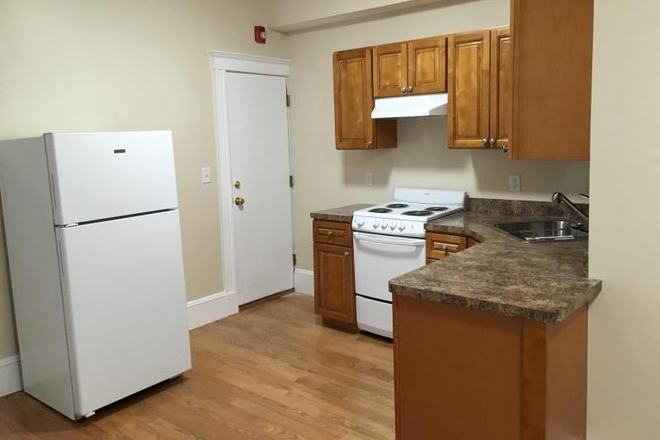 Visit hubrealtyproperties.com - Prime location, renovated 4 bedroom 2 bathroom with dishwasher, on green line T