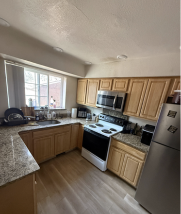 Downstairs kitchen - Fully Loaded Room Near CU Boulder (On Hill) - Parking, Laundry, Backyard & More Townhome