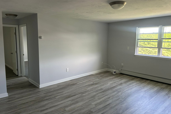 Living Room with nice outside view - Meadow View Apartments