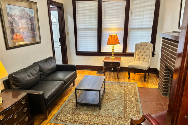 Living Room - Fully Furnished Charming 3 BR, 2 Bath house. Walk to UC . Available Aug. 1, 2026