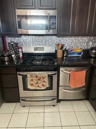 Kitchen - Primary room with Bathroom - in a 3 bedroom 2 bath home- FEMALE only