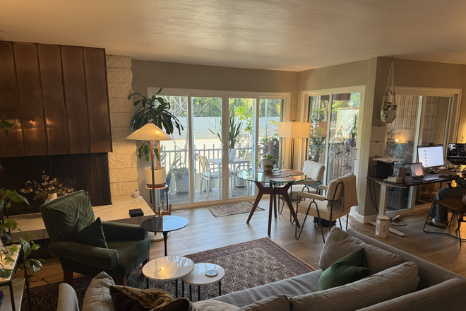 Living room / dining / work area - 2bd condo with 2 balconies, swimming pool. 10min cycle to UCSD. 15min walk to beach.