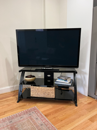 Living Room TV - Furnished 2 BR/1.5BA Townhouse Near HU Campus