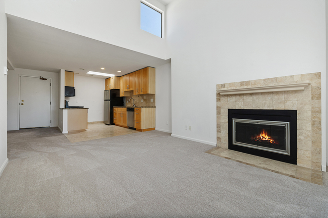 Living room with skylight - Top-Floor 2BR/2BA by UCSD: Vaulted Ceilings, Skylights, 3 Parking Spaces, A/C, Pet OK